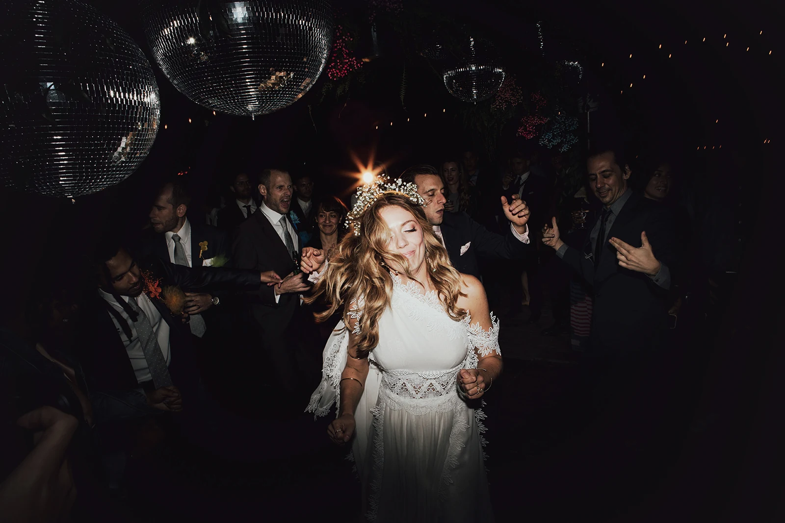 Bride beneath a stone arch in Prospect Park